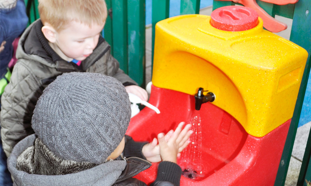 Teal mobile hand washing units for children