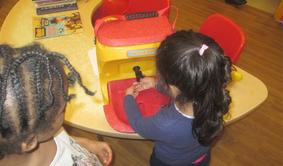 Children at the Old Fire Station Nursery try out their new KiddiWash portable sink