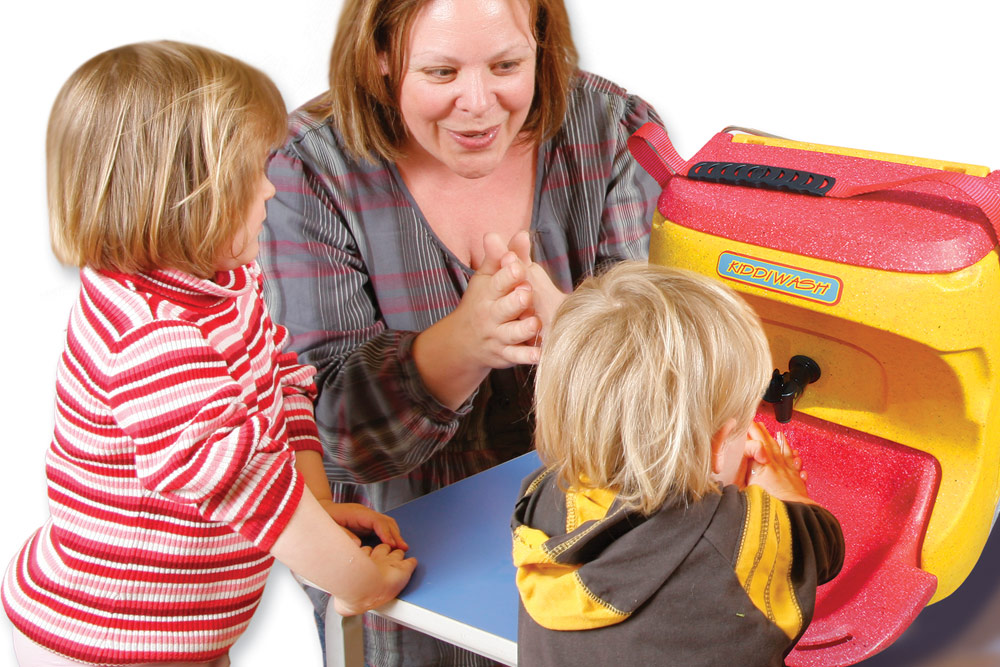 Teaching children to wash hands with a KiddiWash