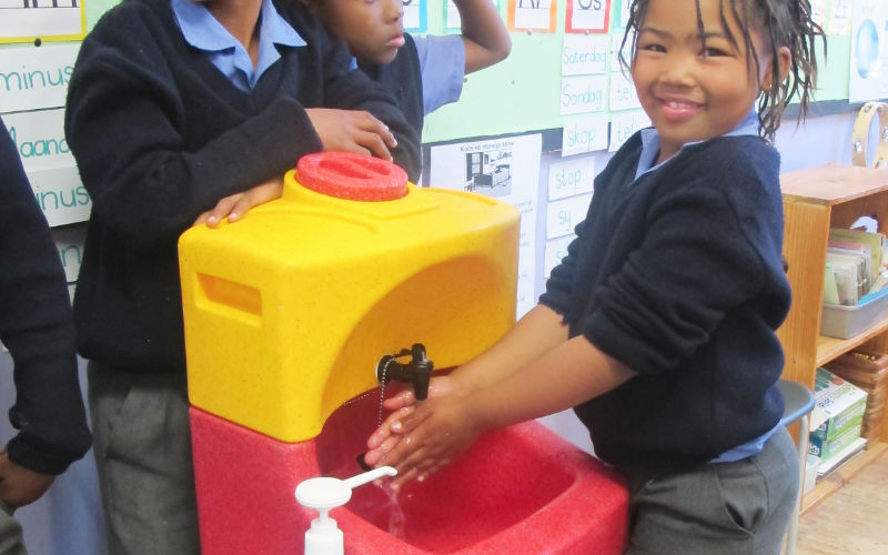 The Teal KiddiSynk being used to wash hands in a school classroom