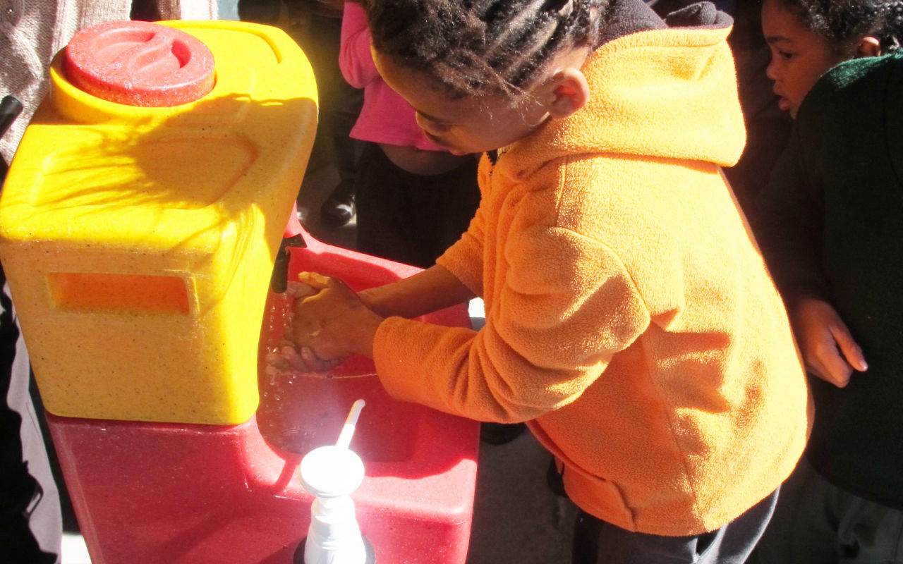 Learning to wash hands with a KiddiSynk mobile handwash unit