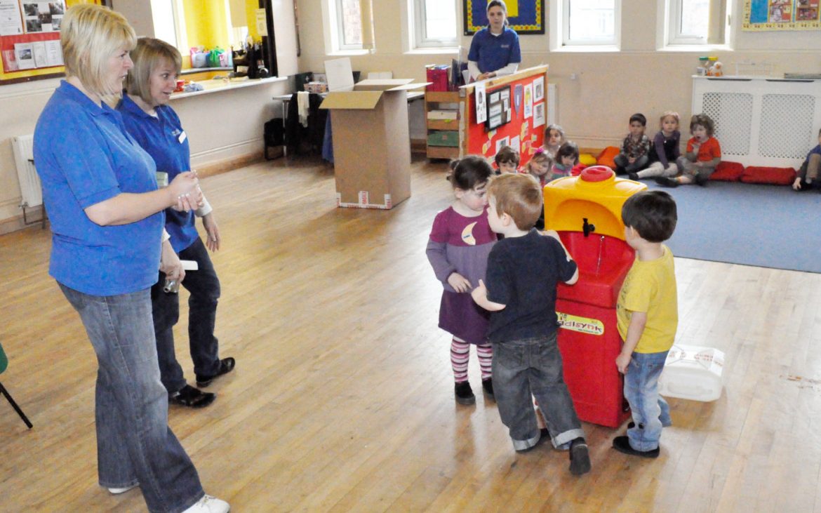 Preschool children learning to wash their hands